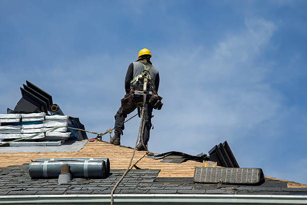 Professional Gutter Installation technician working in Rutland, VT